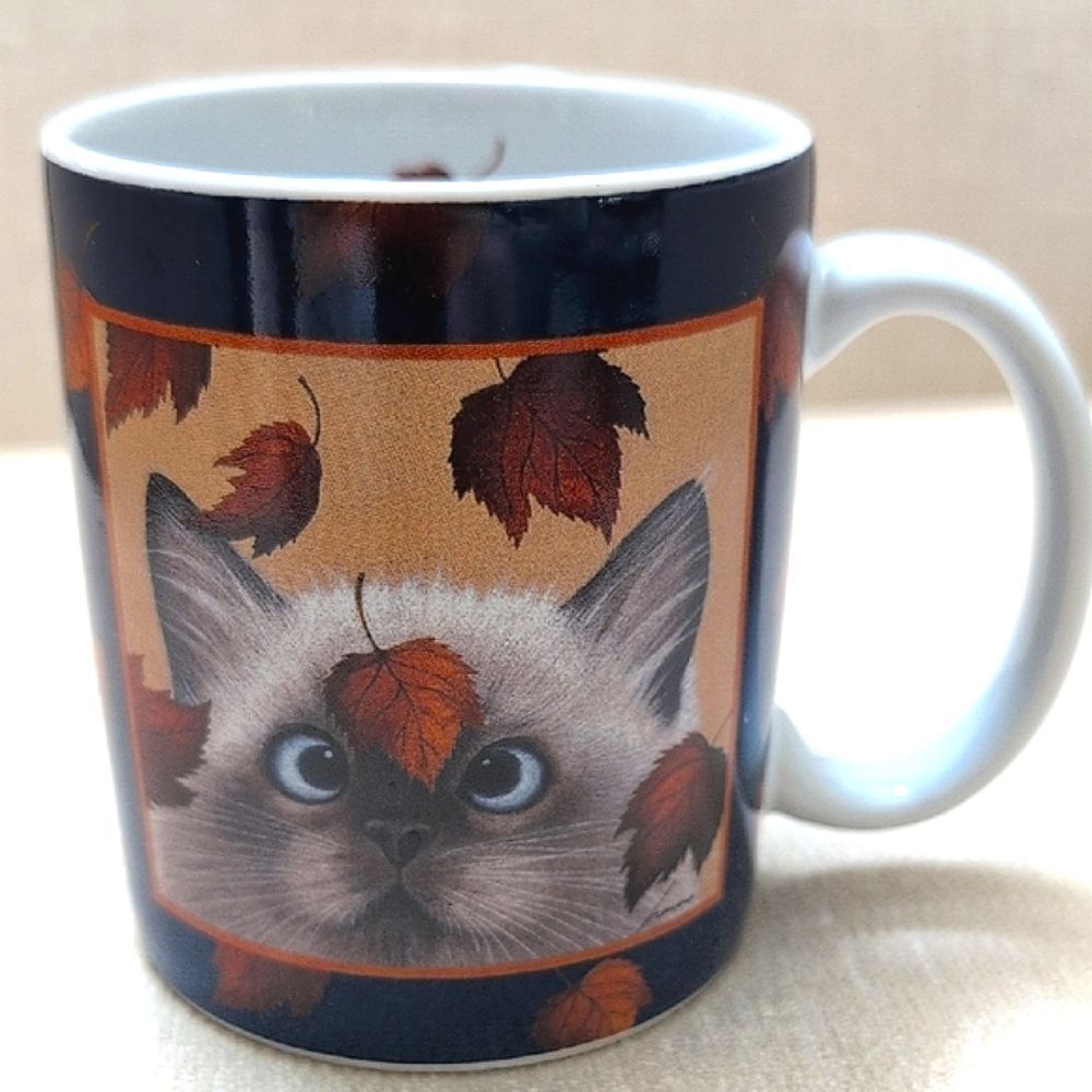 Vintage Catching Leaves Coffee Cat Mug By Lang & Wise Artwork by Lowell Herrero